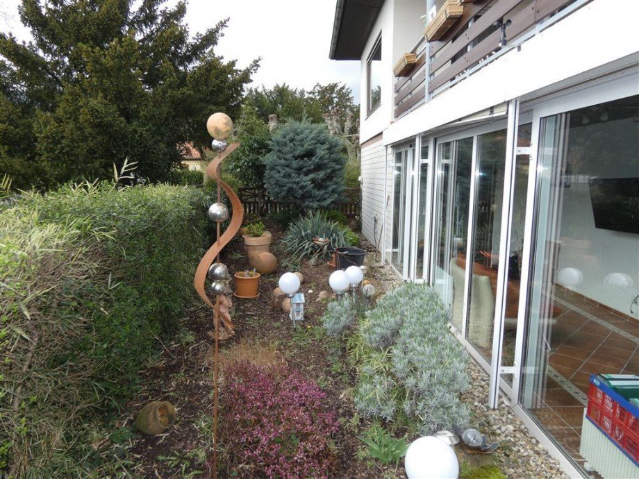 Gartenbereich und Wintergarten Einfamilienhaus Deidesheim